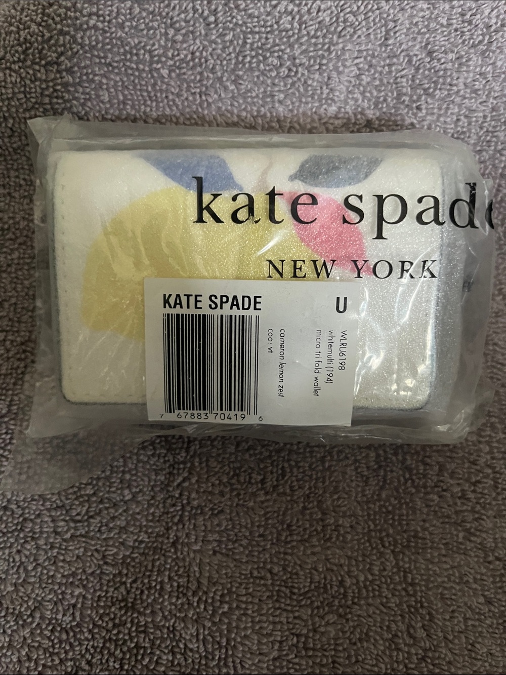 kate spade White multi micro tri fold with Yellow, Pink & Blue Floral Motif